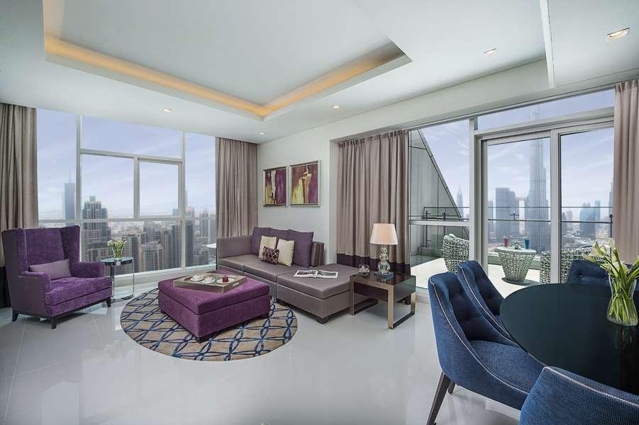 Damac Maison Distinction Dubái Habitación foto A living room in a typical apartment