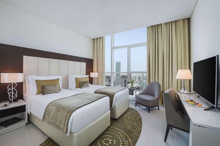 Damac Maison Distinction Dubái Habitación foto Deluxe Room